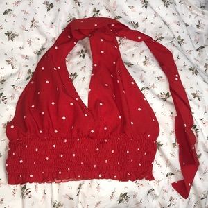 Red ruffle halter crop-top with white polka dots.